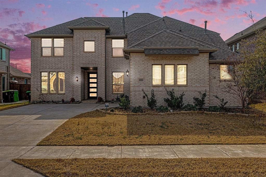 1080 Canuela Way Justin, TX 76247 - Photo 2 of 40 a front view of a house