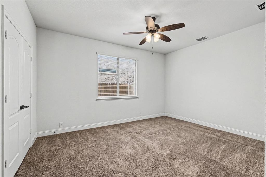 1080 Canuela Way Justin, TX 76247 - Photo 26 of 40 wooden floor in an empty room with a window
