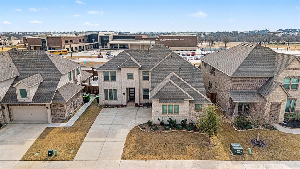1080 Canuela Way Justin, TX 76247 - Photo 4 of 40 an aerial view of a house