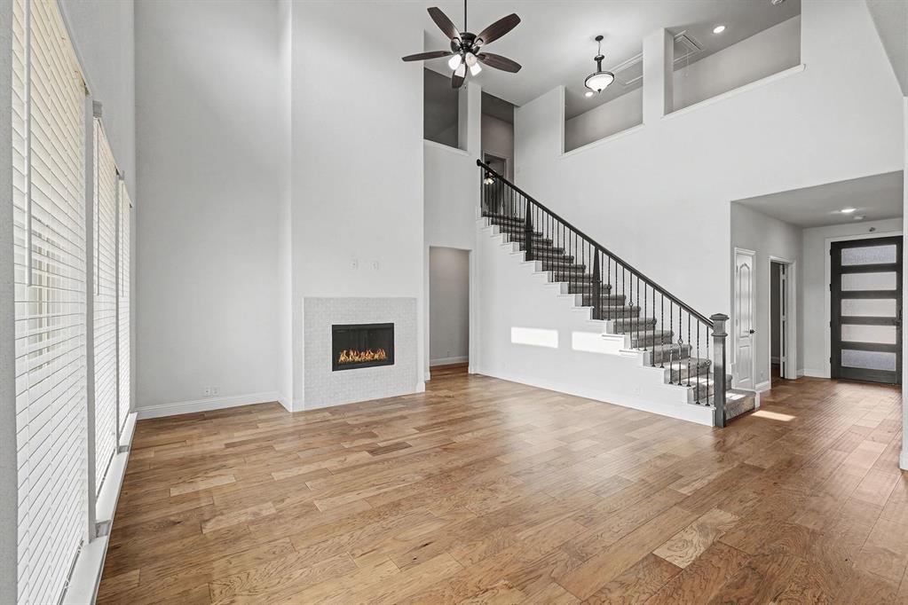 1080 Canuela Way Justin, TX 76247 - Photo 8 of 40 a view of entryway and hall with wooden floor