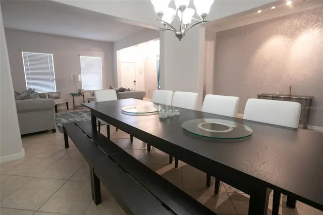 a view of a hallway with seating area