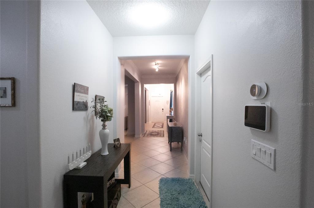 1185 Seburn Road Apopka, FL 32703 - Photo 13 of 47 a view of a hallway with seating area