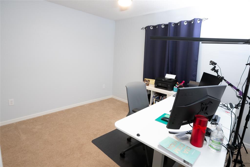 1185 Seburn Road Apopka, FL 32703 - Photo 33 of 47 a view of a workspace with furniture