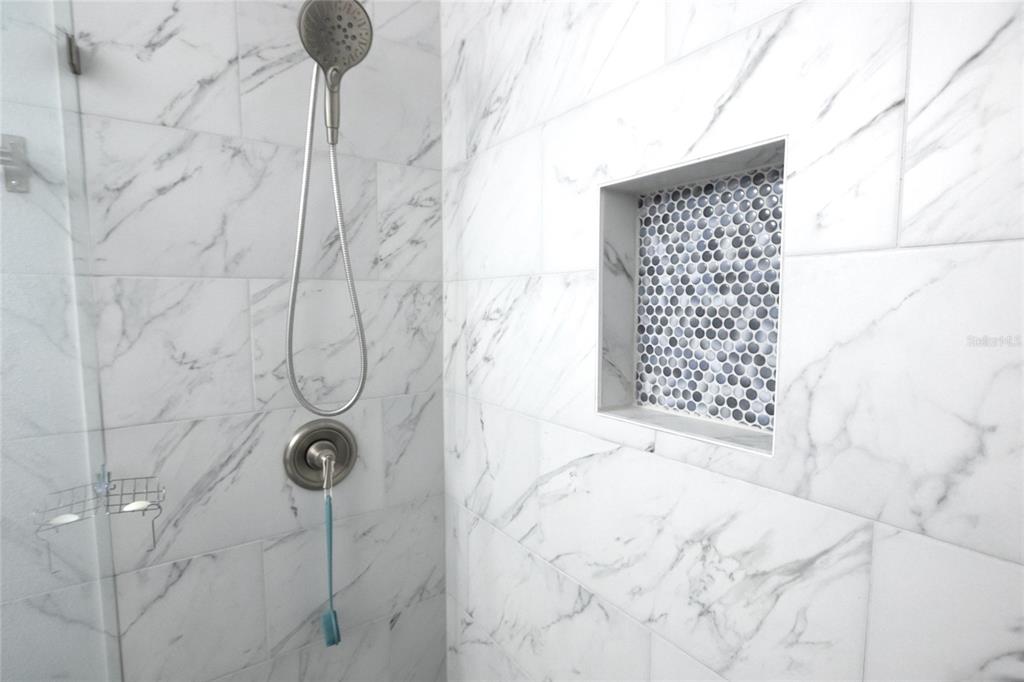 1185 Seburn Road Apopka, FL 32703 - Photo 38 of 47 a bathroom with a shower