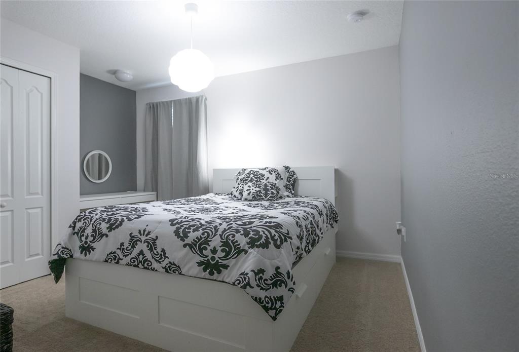 1185 Seburn Road Apopka, FL 32703 - Photo 39 of 47 a bedroom with a bed and a window