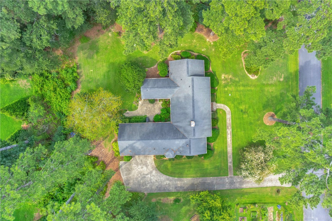 203 Fox Creek Road Anderson, SC 29621 - Photo 33 of 36 This aerial view showcases a residence nestled amidst lush, verdant landscaping.
