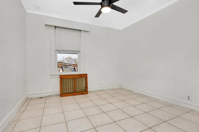 a kitchen with cabinets appliances and a sink