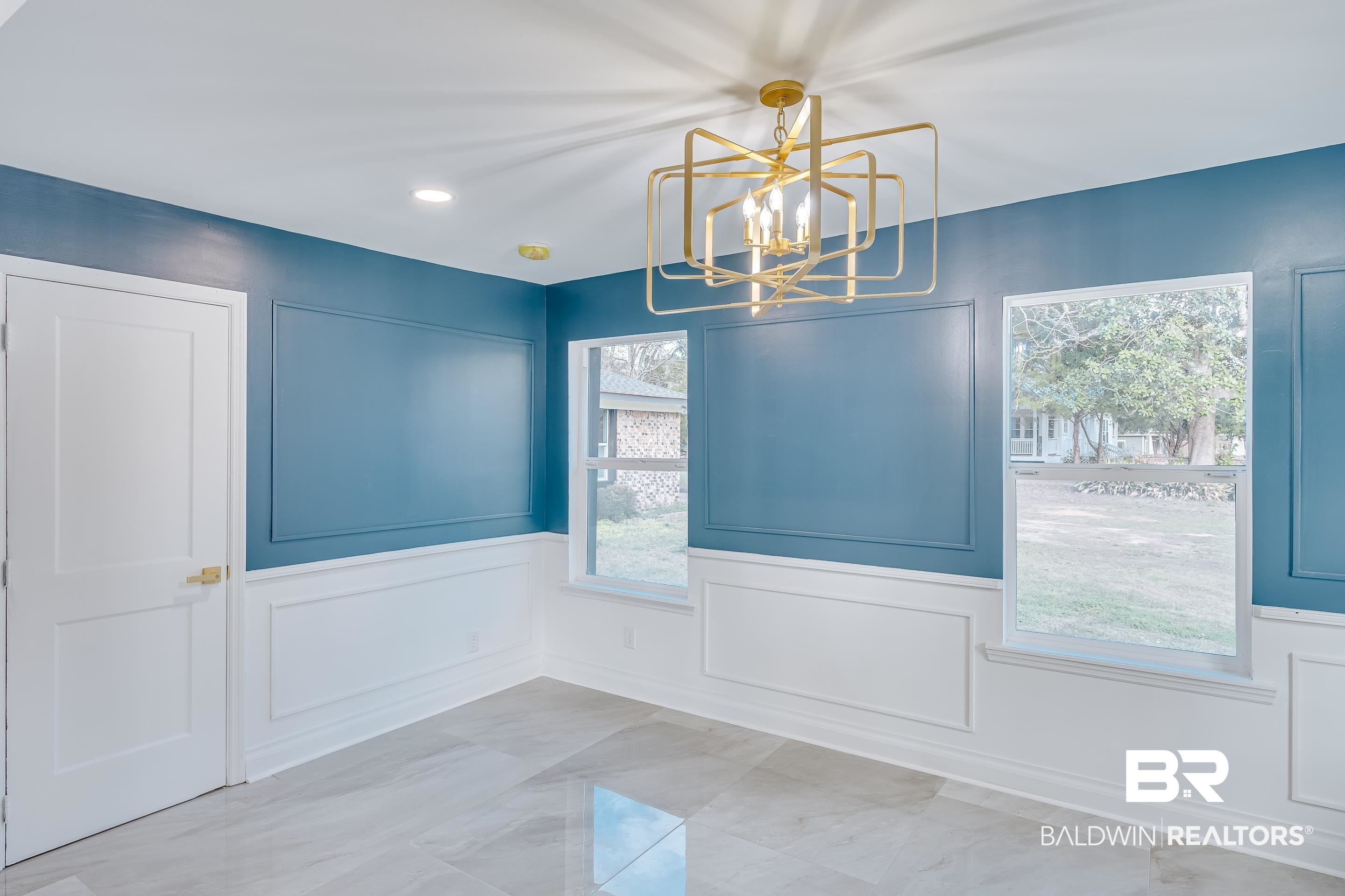 1190 Military Road Mount Vernon, AL 36560 - Photo 12 of 47 Unfurnished dining area with a decorative wall, a wainscoted wall, a chandelier, and recessed lighting