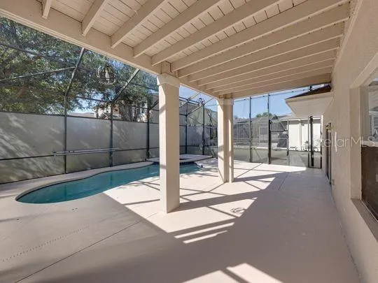 a kitchen with a sink cabinets and window