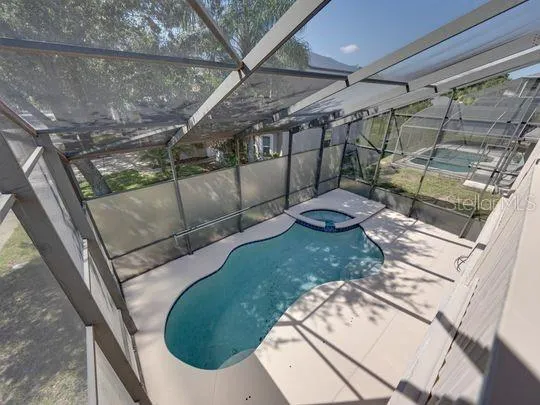 a outdoor dining space with furniture and garden view