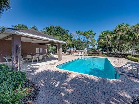 a garden view with a seating space