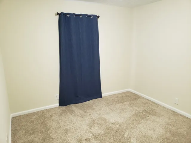 a view of wooden wall