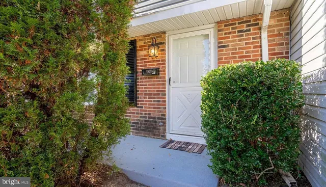 a view of house with backyard
