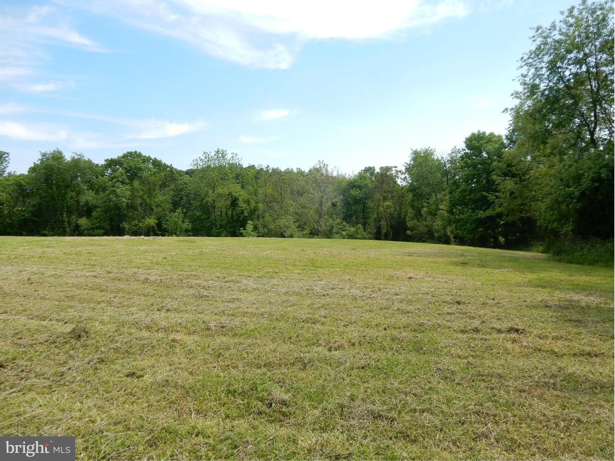 9547 Liberty Road Frederick, MD 21701 - Photo 7 of 18 a view of a field with an outdoor space