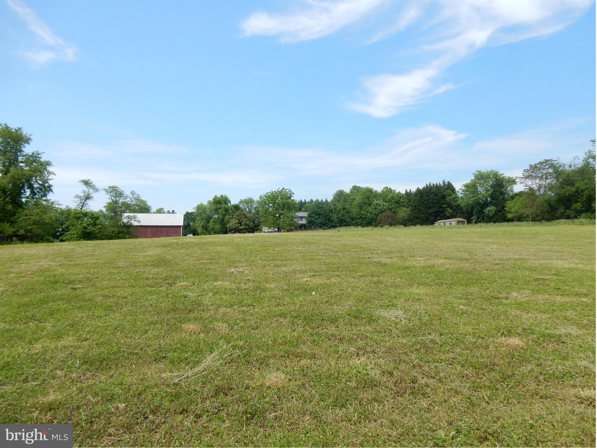 9547 Liberty Road Frederick, MD 21701 - Photo 9 of 18 a view of a field with an ocean