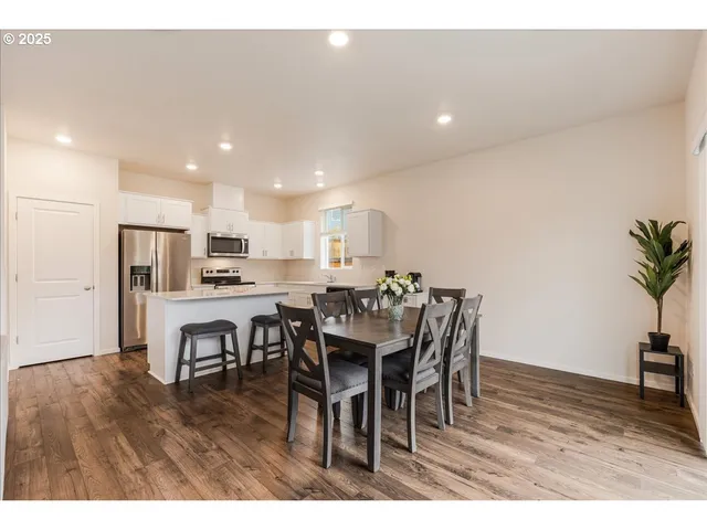 a view of a dining room with furniture