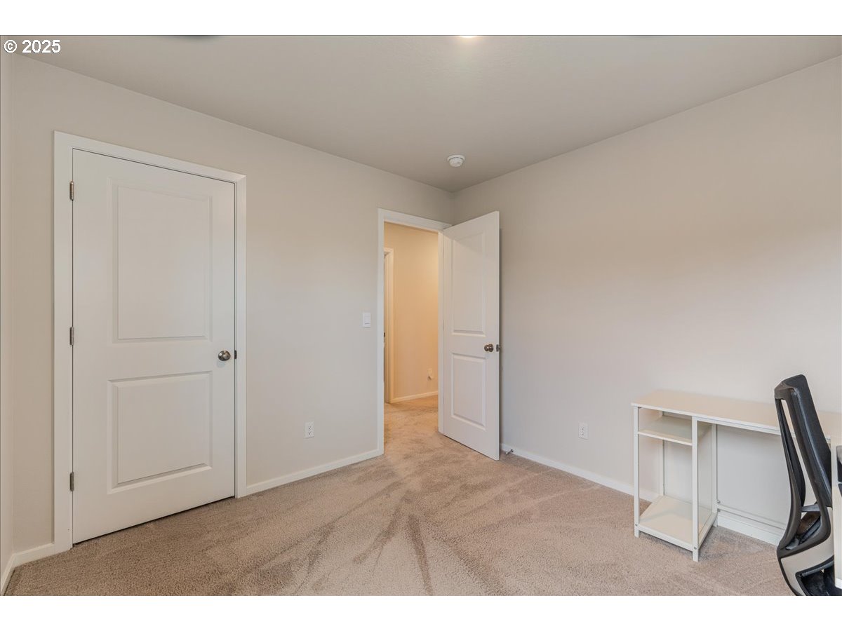 3499 Southeast Paropa Avenue Gresham, OR 97080 - Photo 29 of 48 a view of room with wooden floor