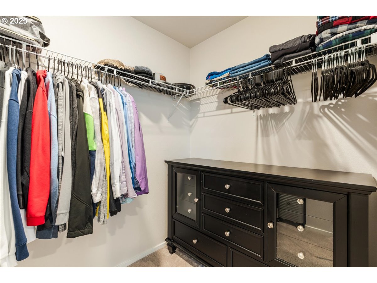 3499 Southeast Paropa Avenue Gresham, OR 97080 - Photo 35 of 48 a view of walk in closet with clothes