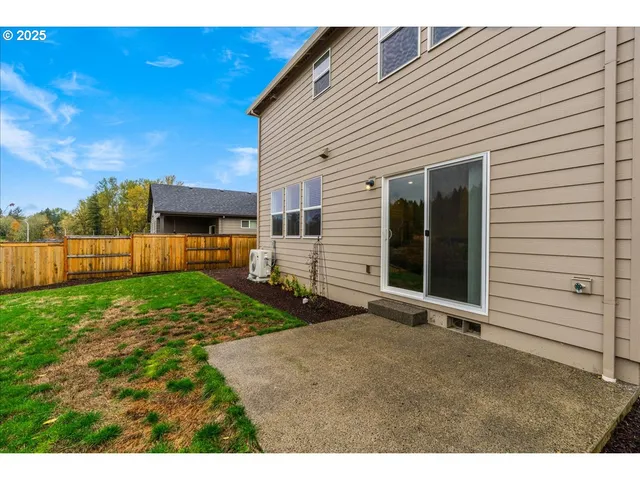 a view of a backyard with plants