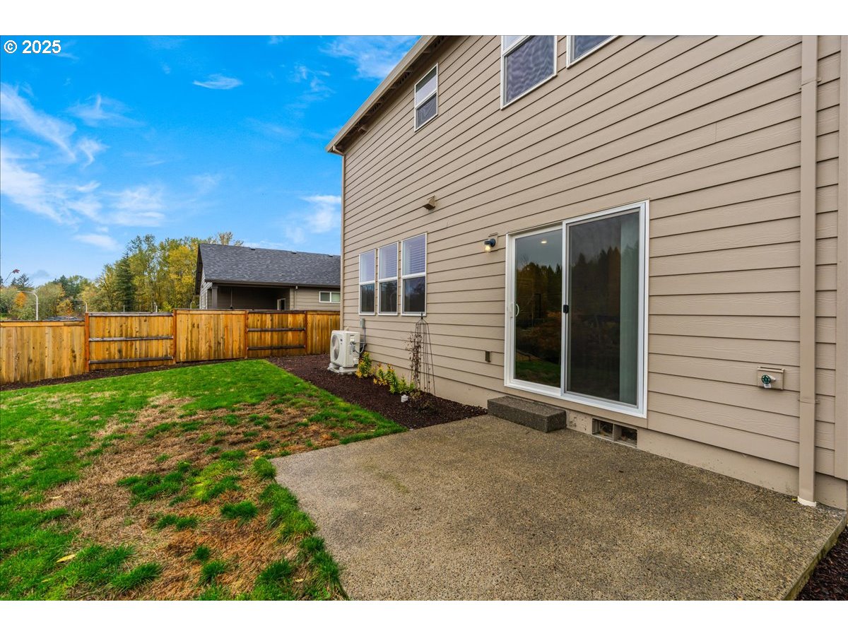 3499 Southeast Paropa Avenue Gresham, OR 97080 - Photo 38 of 48 a view of a house with backyard and a garden
