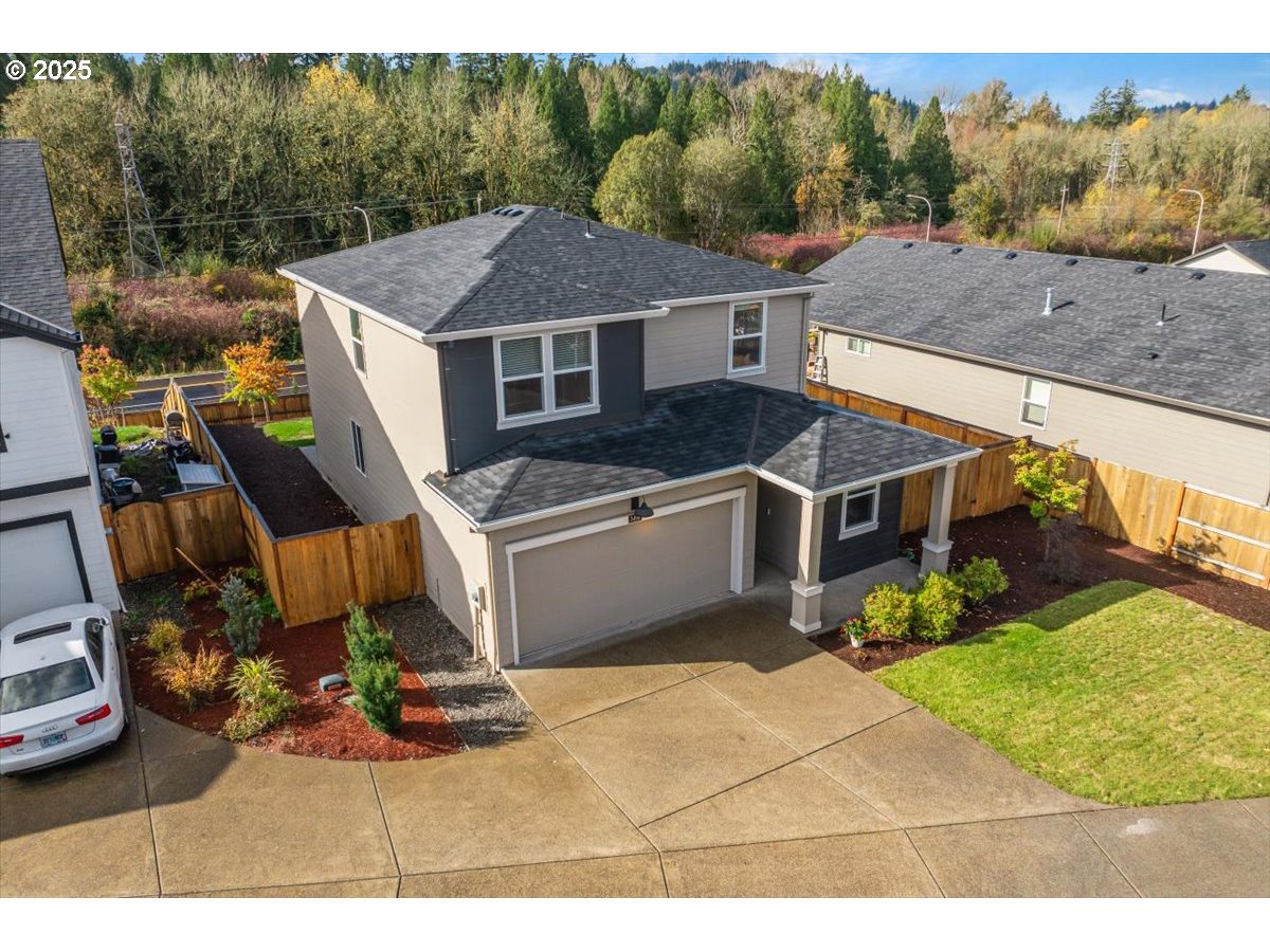 3499 Southeast Paropa Avenue Gresham, OR 97080 - Photo 5 of 48 a view of a house with backyard porch and sitting area