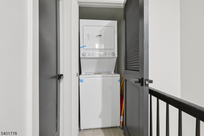 540 East 25th Street Paterson, NJ 07514 - Photo 6 of 10 a view of storage and utility room with washer and dryer