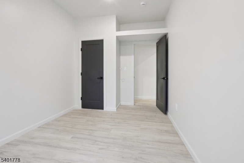 540 East 25th Street Paterson, NJ 07514 - Photo 8 of 10 a view of a hallway