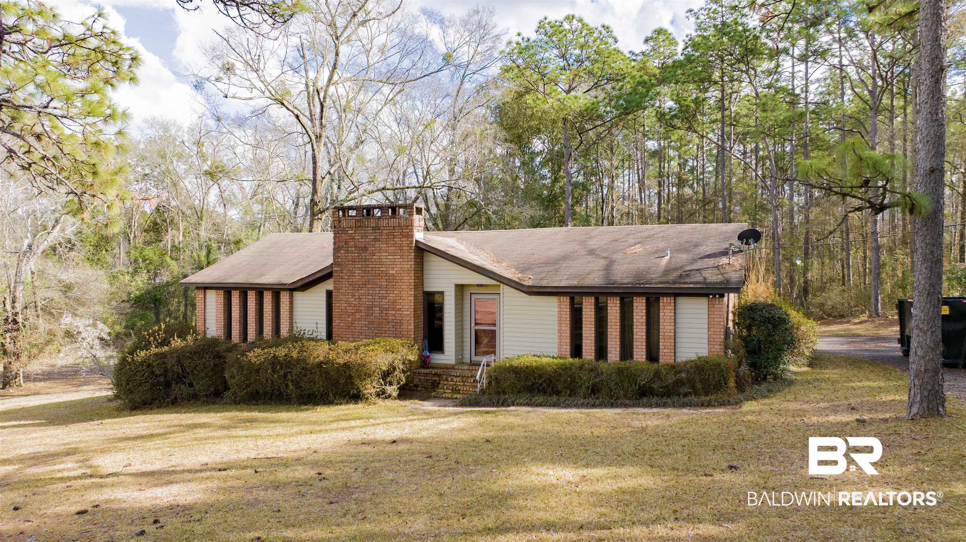 9083 Northfield Road Semmes, AL 36575 - Photo 8 of 15 View of front of property featuring a chimney and a front lawn