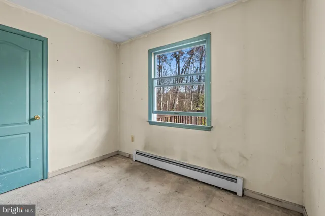 an empty room with windows