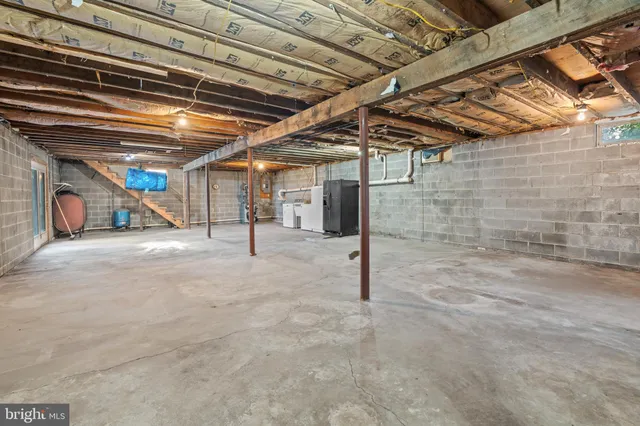 a view of a room with wooden racks