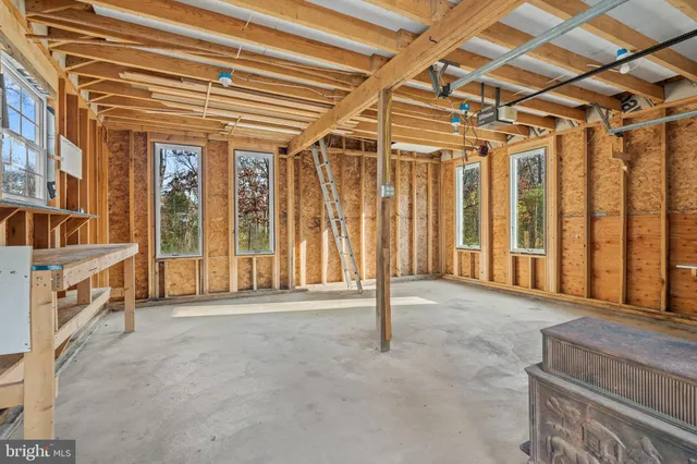 a view of an empty room with a balcony