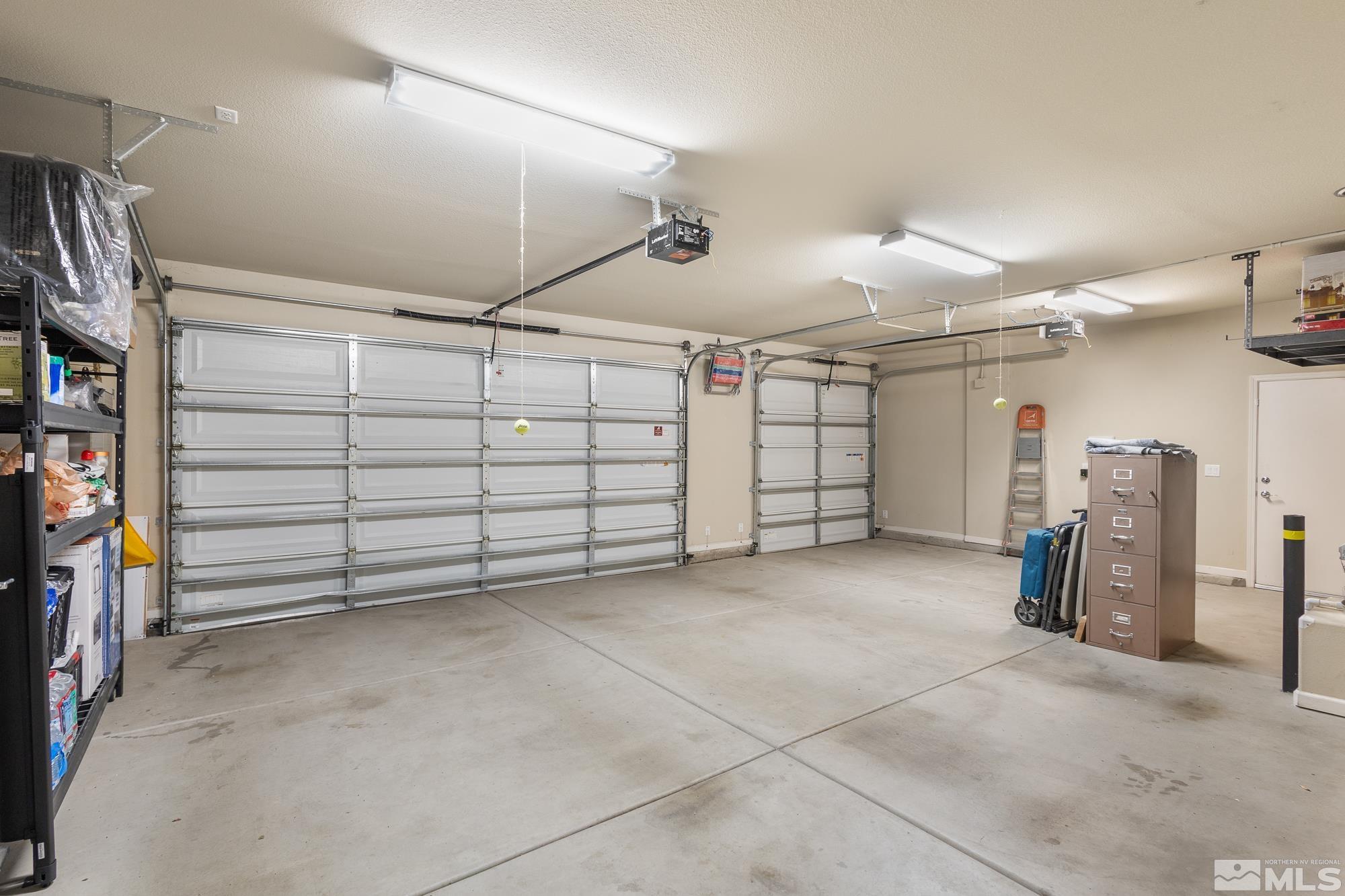 2875 Bonfire Lane Reno, NV 89521 - Photo 12 of 39 a view of a garage with furniture