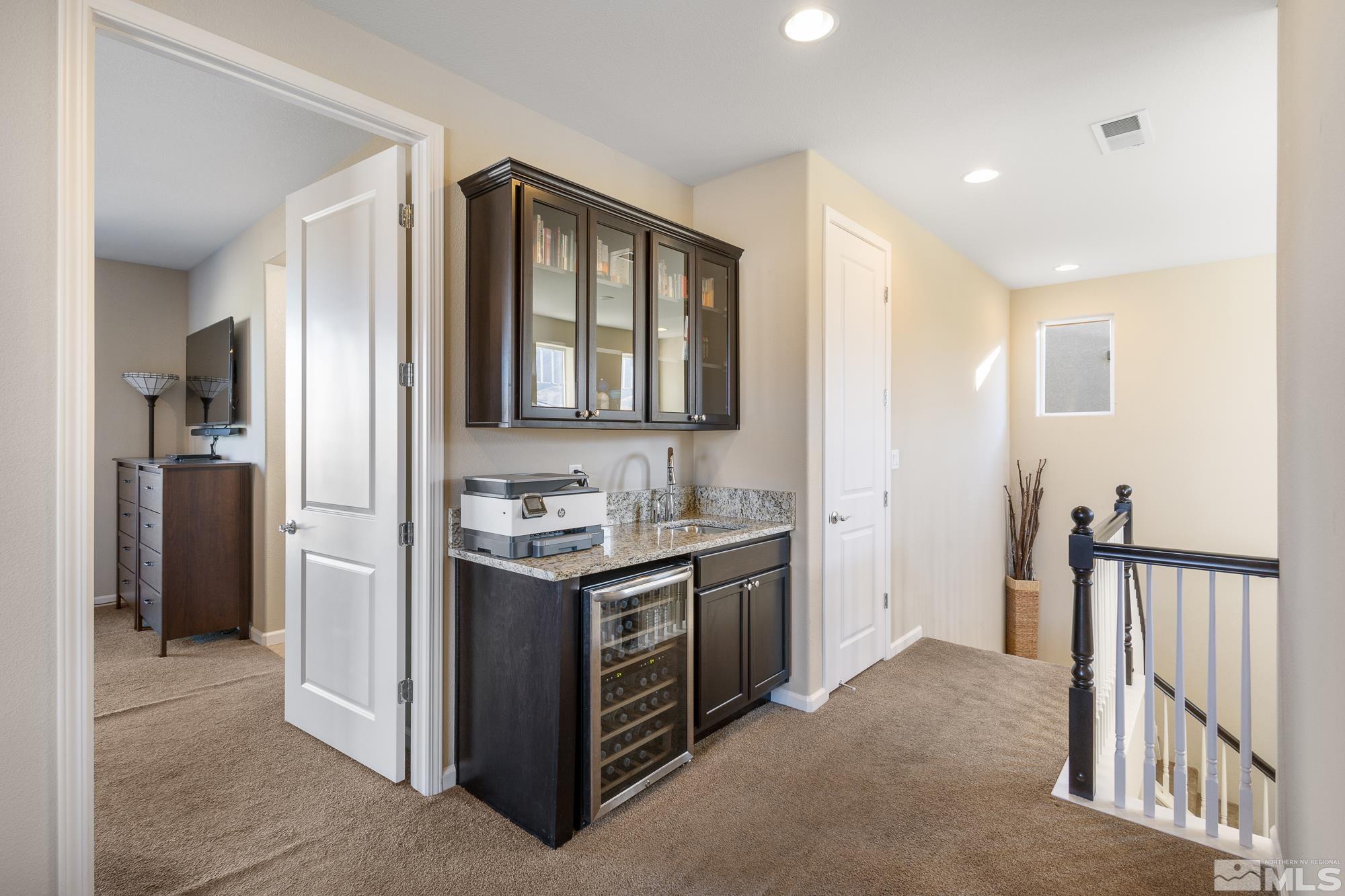 2875 Bonfire Lane Reno, NV 89521 - Photo 14 of 39 a spacious bathroom with a granite countertop sink and a mirror