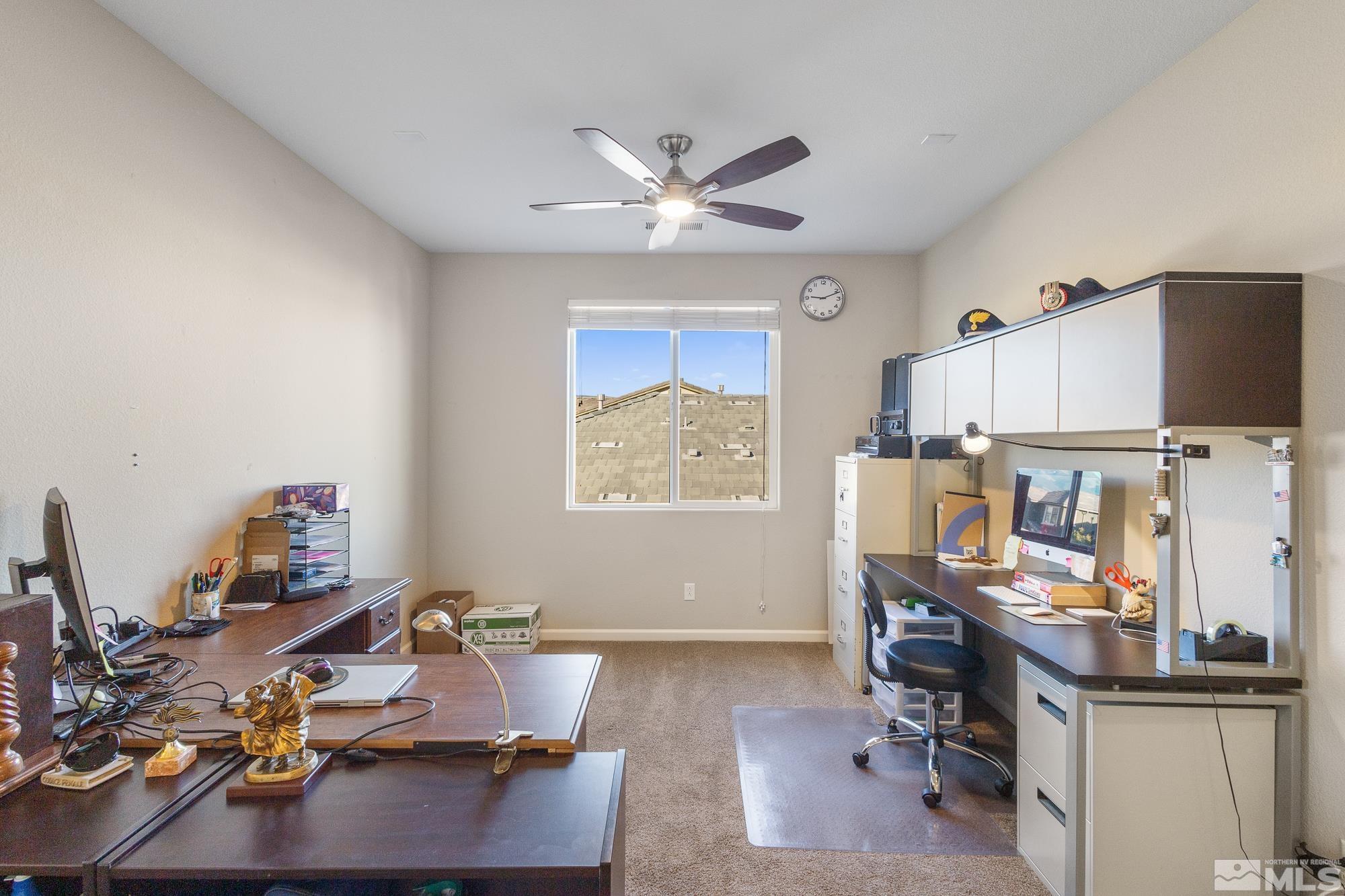 2875 Bonfire Lane Reno, NV 89521 - Photo 15 of 39 a workspace with furniture and wooden floor