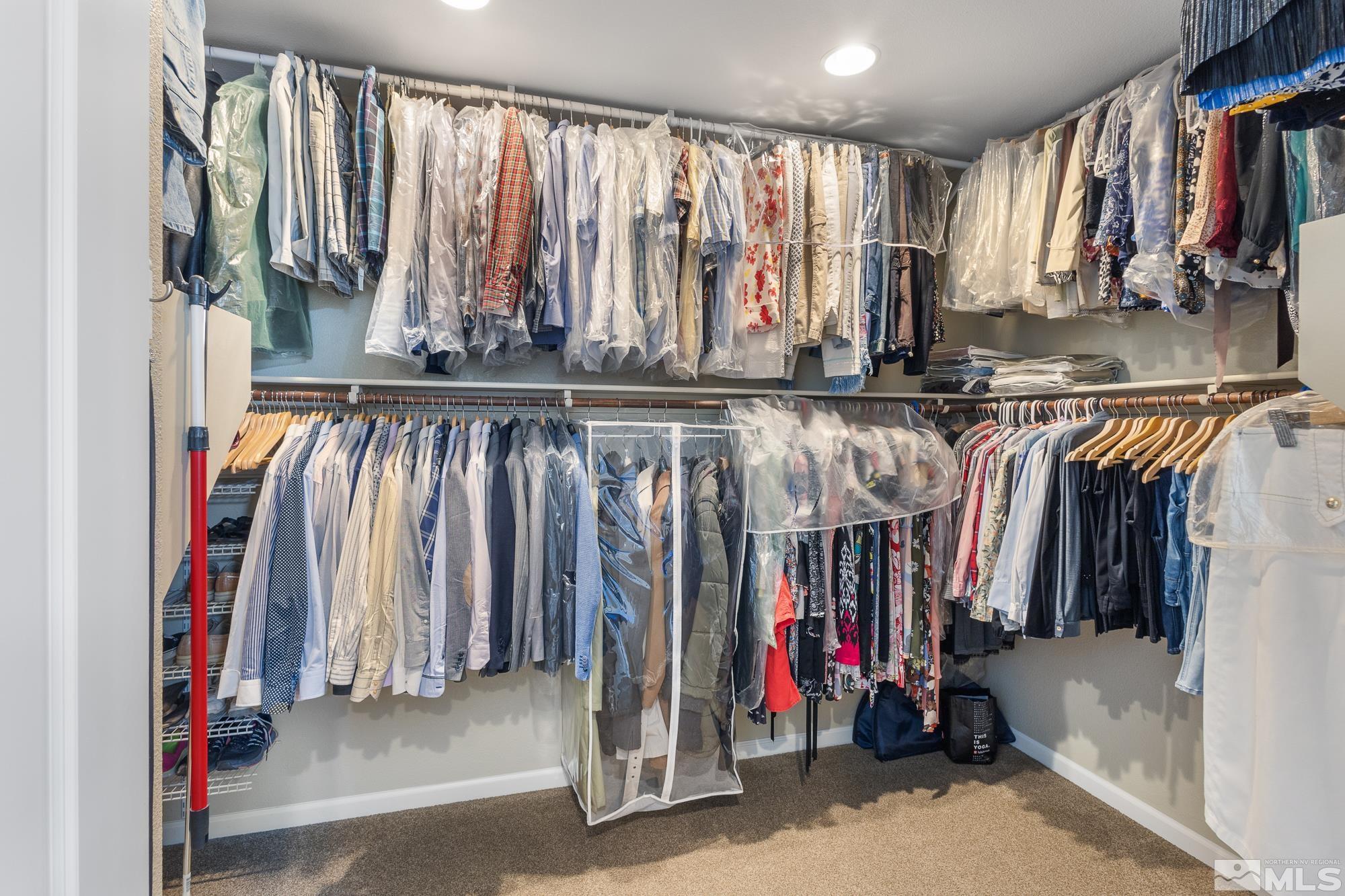 2875 Bonfire Lane Reno, NV 89521 - Photo 20 of 39 a view of walk in closet with clothes and shoes