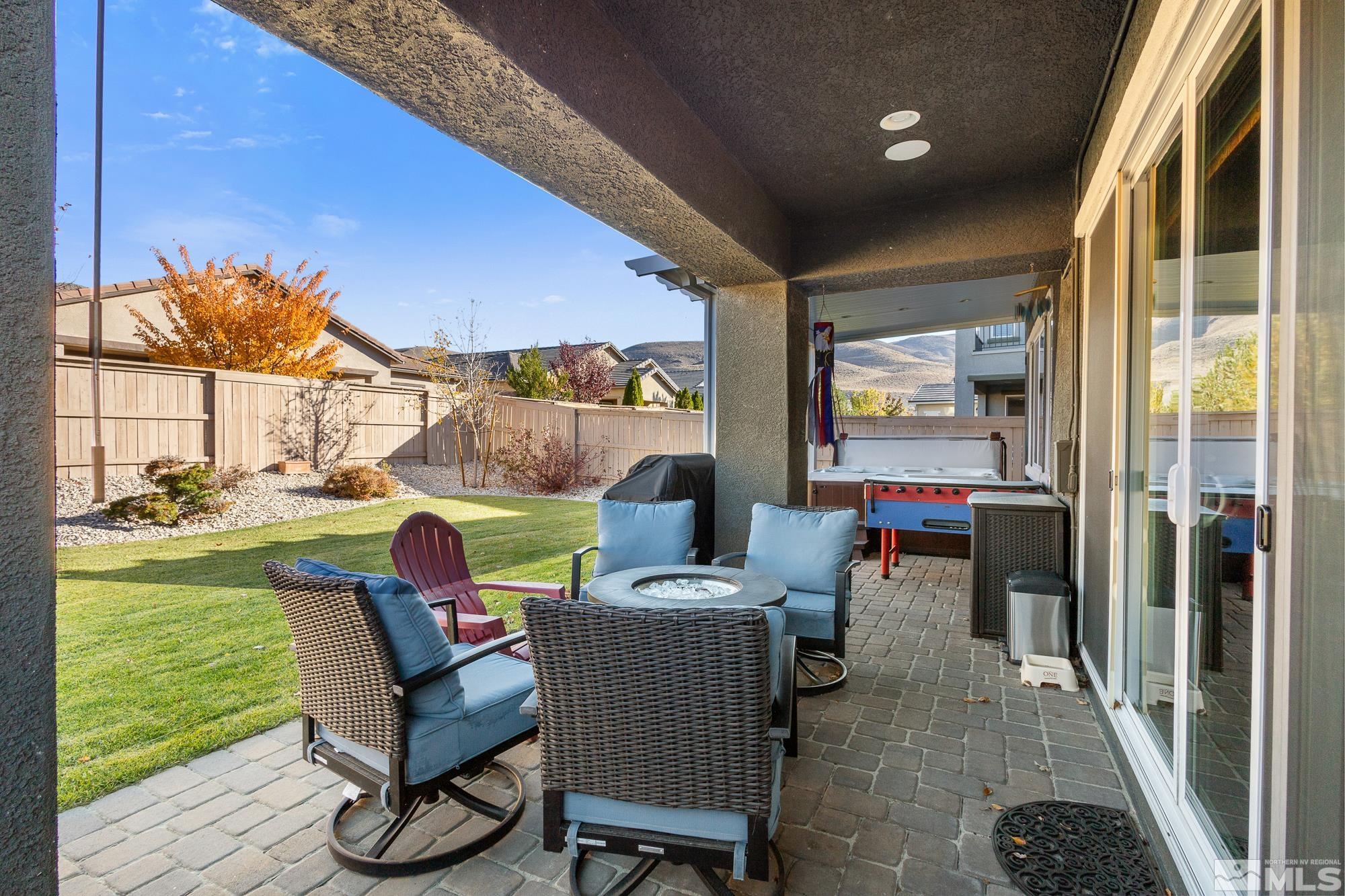 2875 Bonfire Lane Reno, NV 89521 - Photo 27 of 39 a view of a porch with furniture and a yard