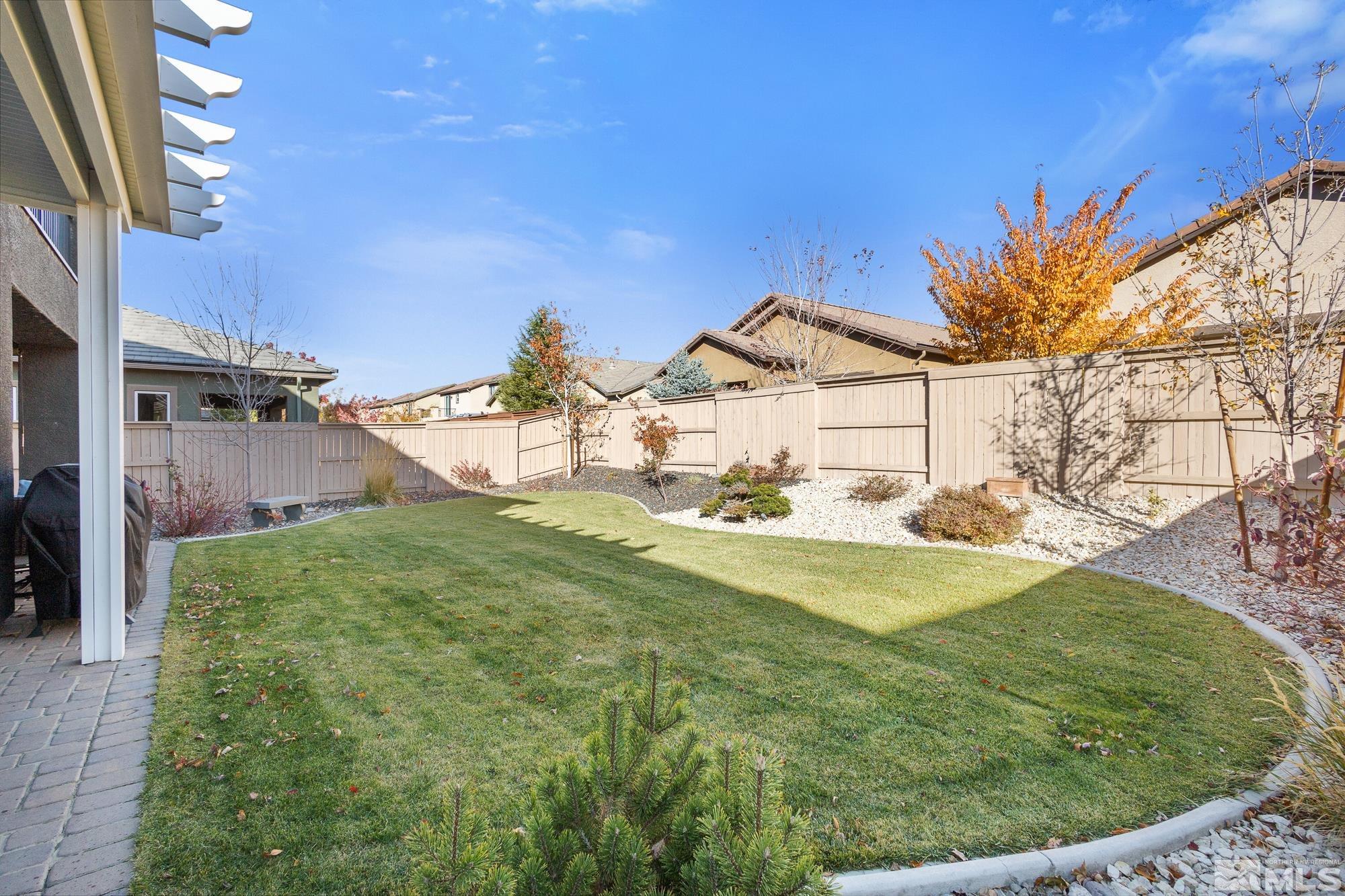 2875 Bonfire Lane Reno, NV 89521 - Photo 31 of 39 a view of a house with a yard