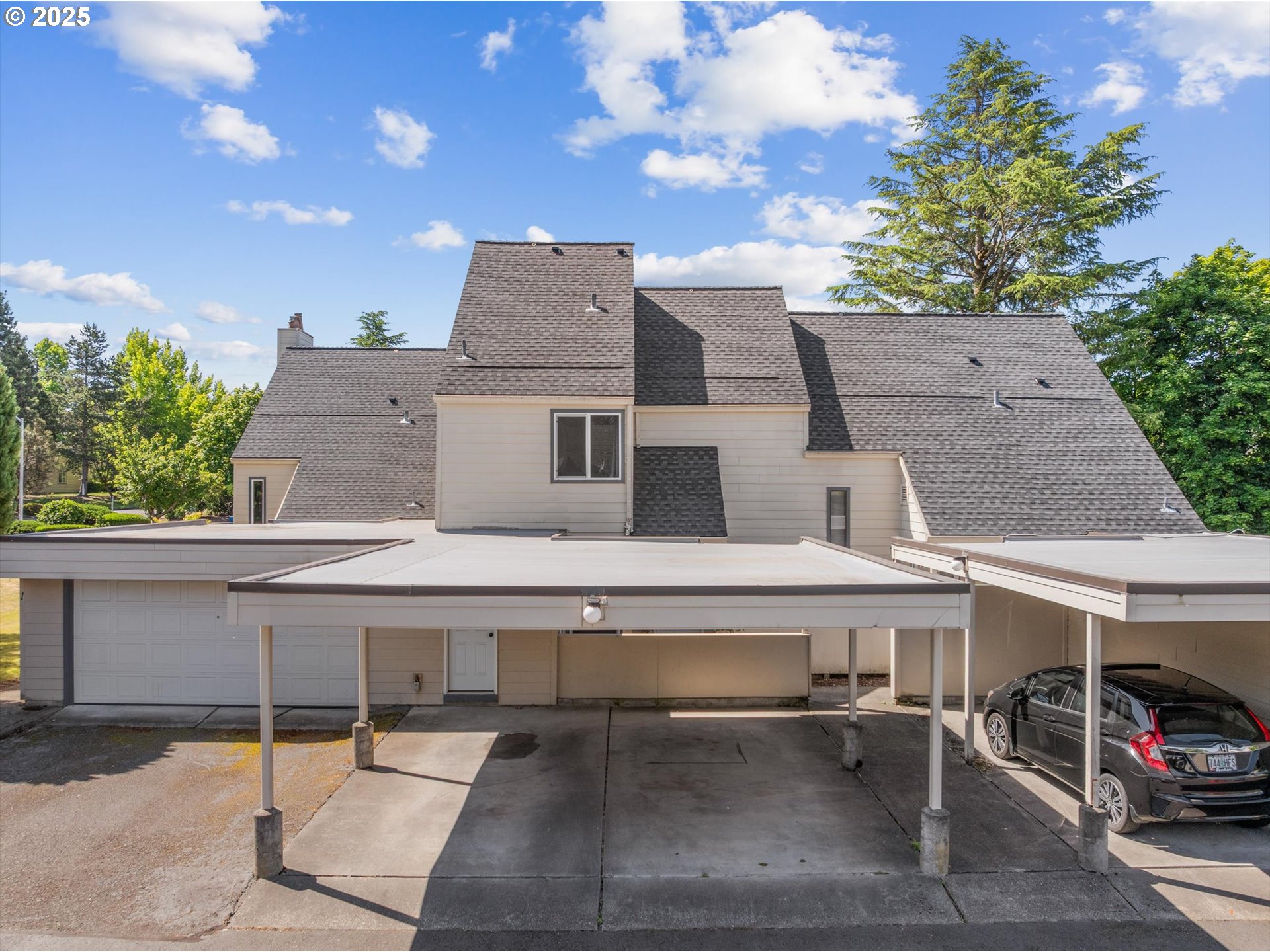 251 Northeast Village Squire Avenue, Unit 2 Gresham, OR 97030 - Photo 2 of 37 Carport