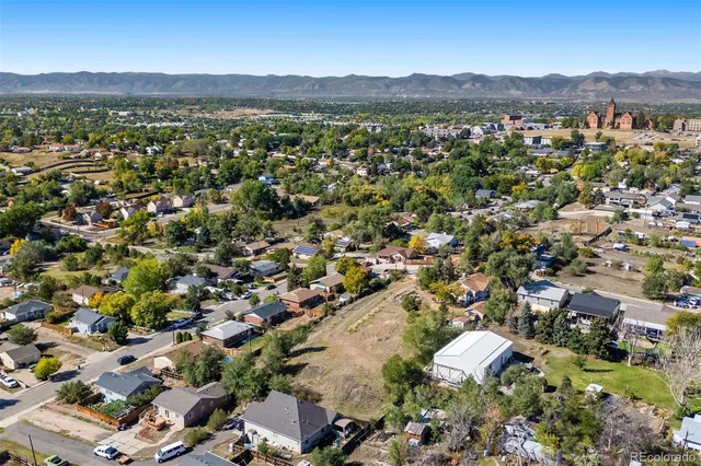 an aerial view of residential house with outdoor space