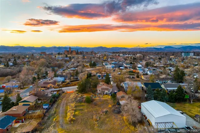 a view of a city with mountains in the background