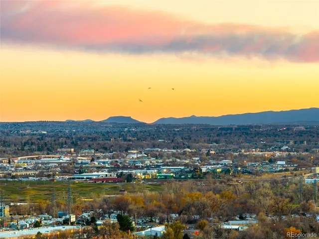 a view of a lake with mountains in the background