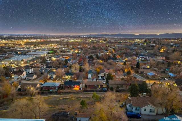 an aerial view of a city with lots of residential buildings