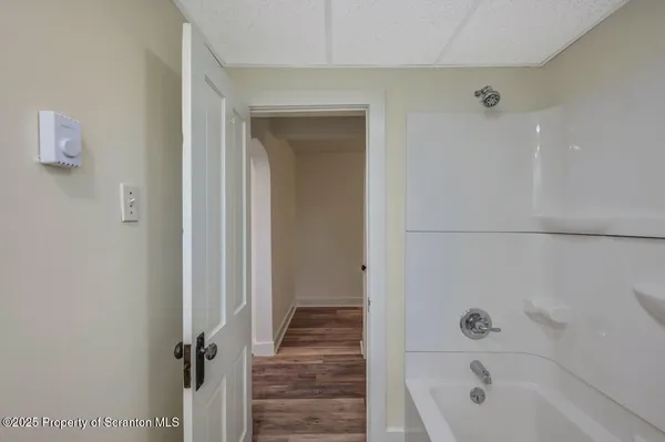a bathroom with a bathtub