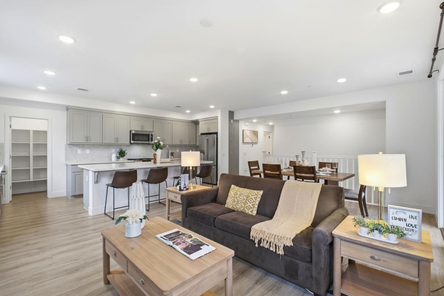 385 Line Street Hayward, CA 94544 - Photo 5 of 38 a living room with furniture and view of kitchen