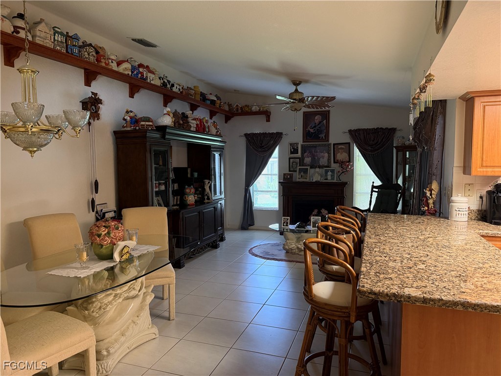 2260 Thompson Road Alva, FL 33920 - Photo 6 of 13 a view of a dining room with furniture