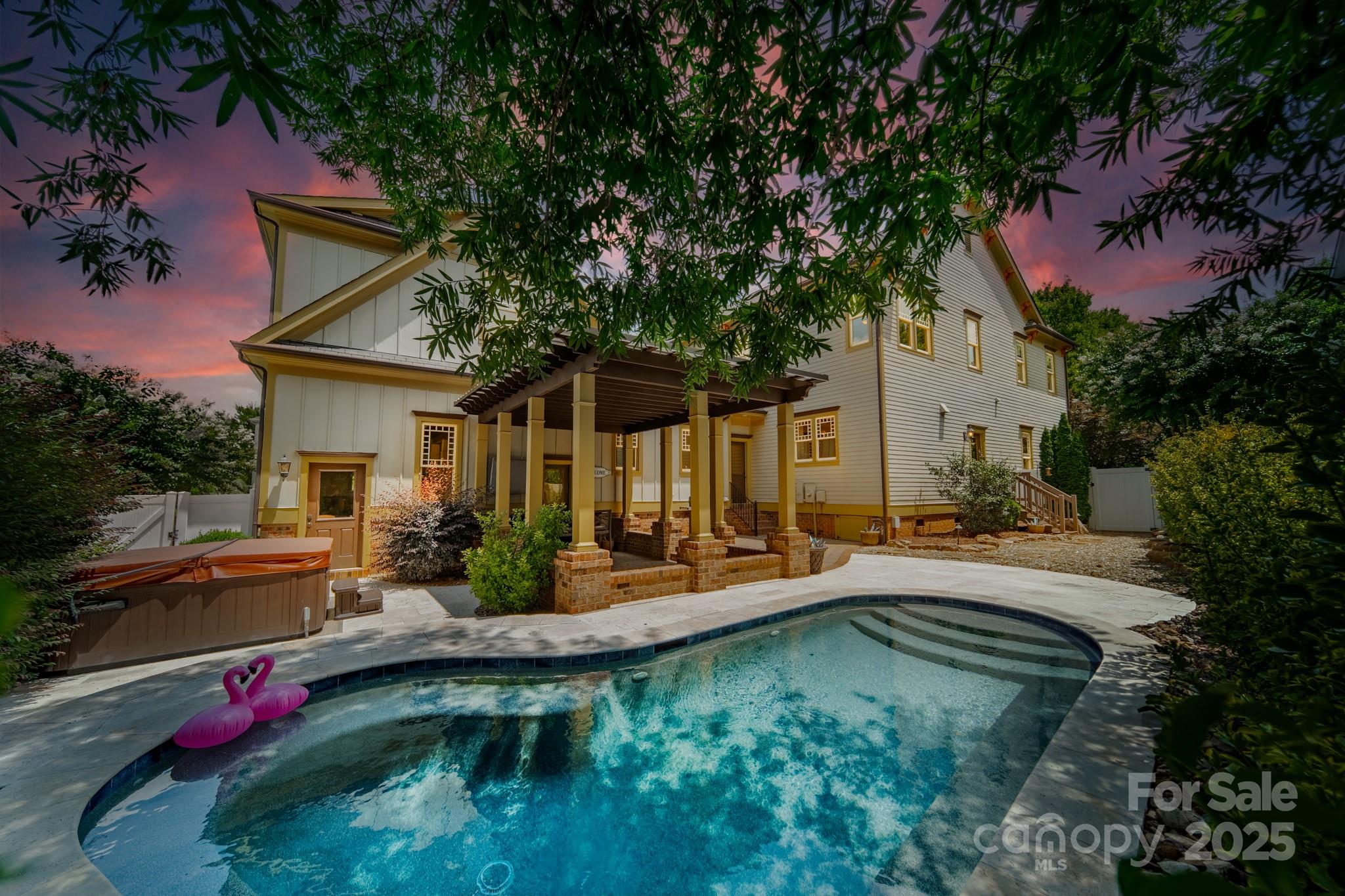 406 Bull Finch Bend Fort Mill, SC 29708 - Photo 2 of 48 a view of a house with backyard swimming pool and sitting area