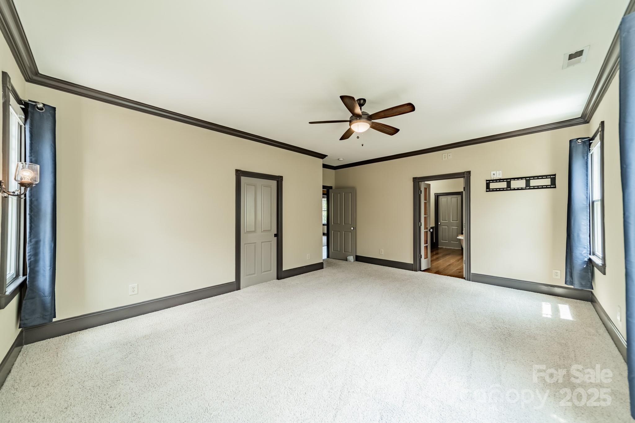 406 Bull Finch Bend Fort Mill, SC 29708 - Photo 26 of 48 an empty room with windows and closet