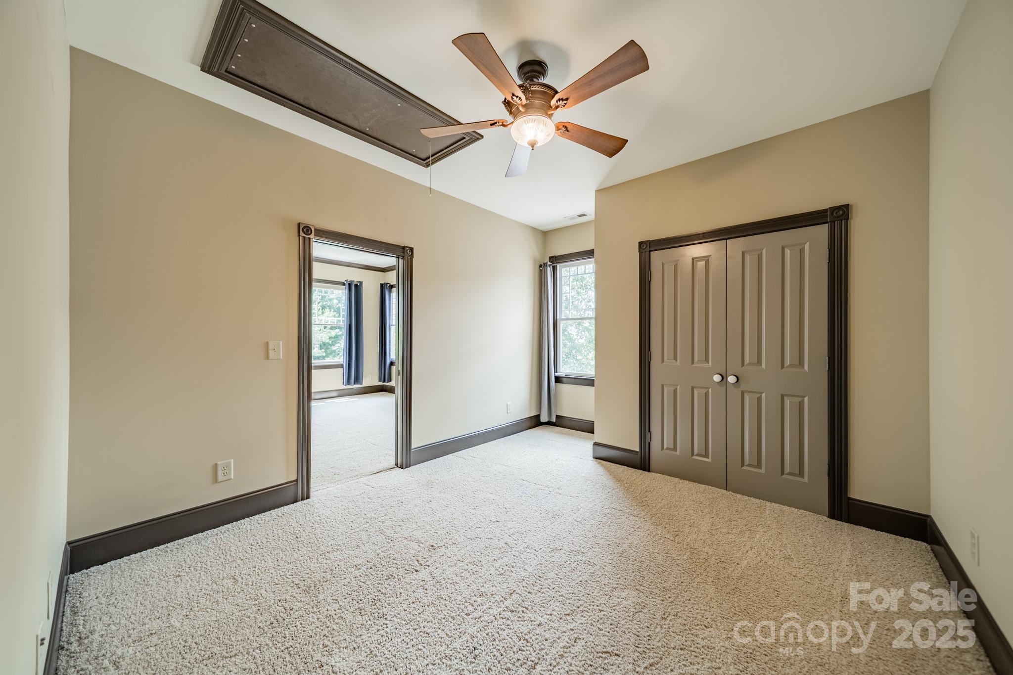 406 Bull Finch Bend Fort Mill, SC 29708 - Photo 27 of 48 a view of a livingroom with a ceiling fan