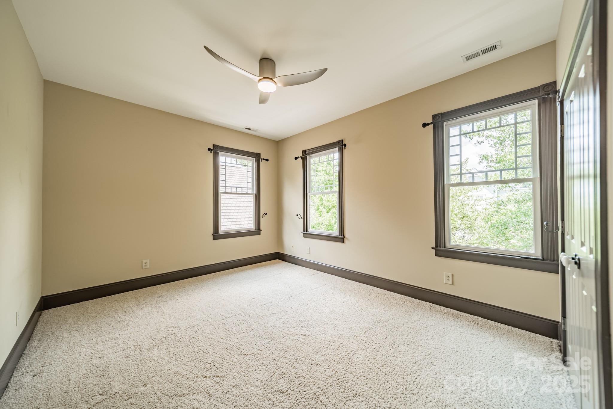 406 Bull Finch Bend Fort Mill, SC 29708 - Photo 31 of 48 a view of an empty room with a window