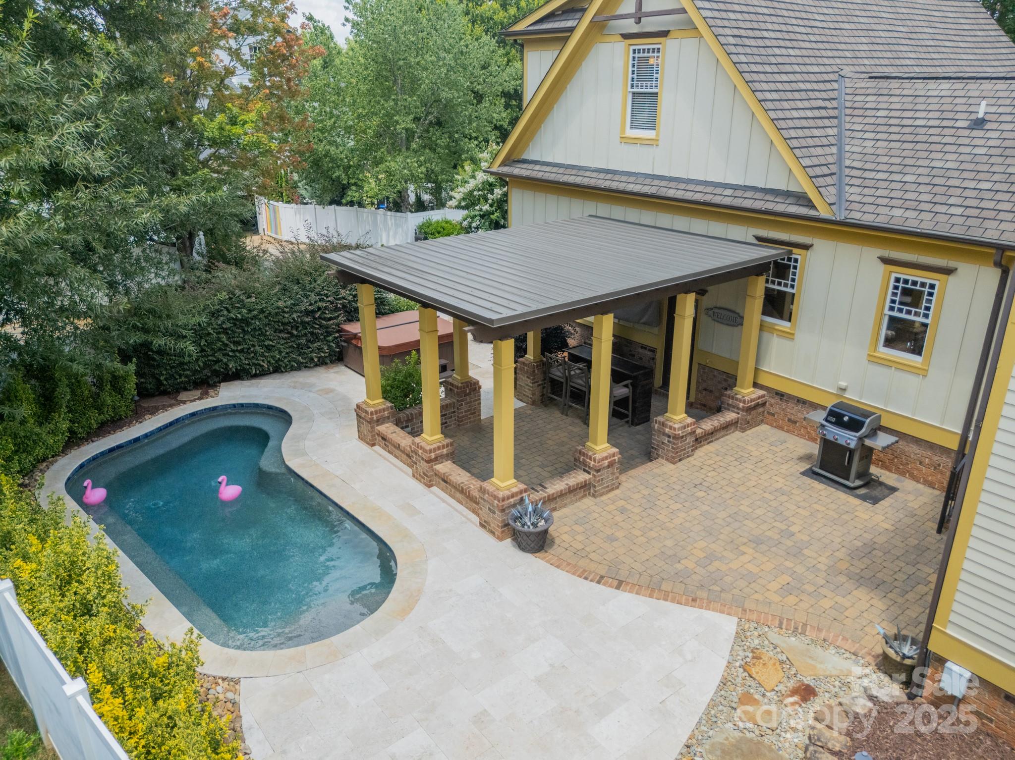 406 Bull Finch Bend Fort Mill, SC 29708 - Photo 36 of 48 an aerial view of a house with a yard and patio